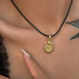 Fossil Sea Shell Kette